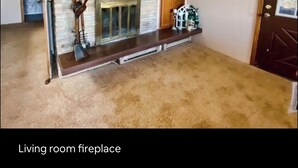 A living room fireplace with a stone wall, a mantelpiece, and a television above it. - Relax and recharge at The Spot (Fall River)