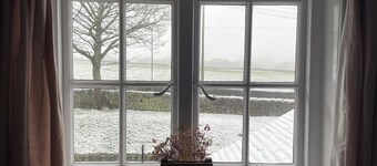 Traditional cottage with stunning views and walks on the doorstep.