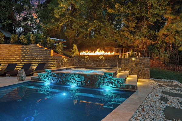 Welcome to Latitude Adjustment. Enjoy the beautiful pool with hot tub.