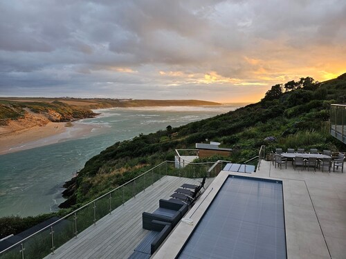 New Spectacular 7 bedroom house on south facing cliff overlooking beach and sea.