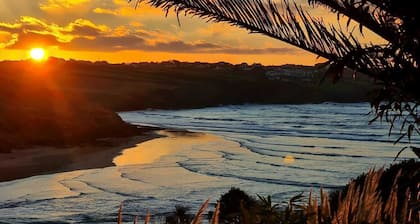 New Spectacular 7 bedroom house on south facing cliff overlooking beach and sea.