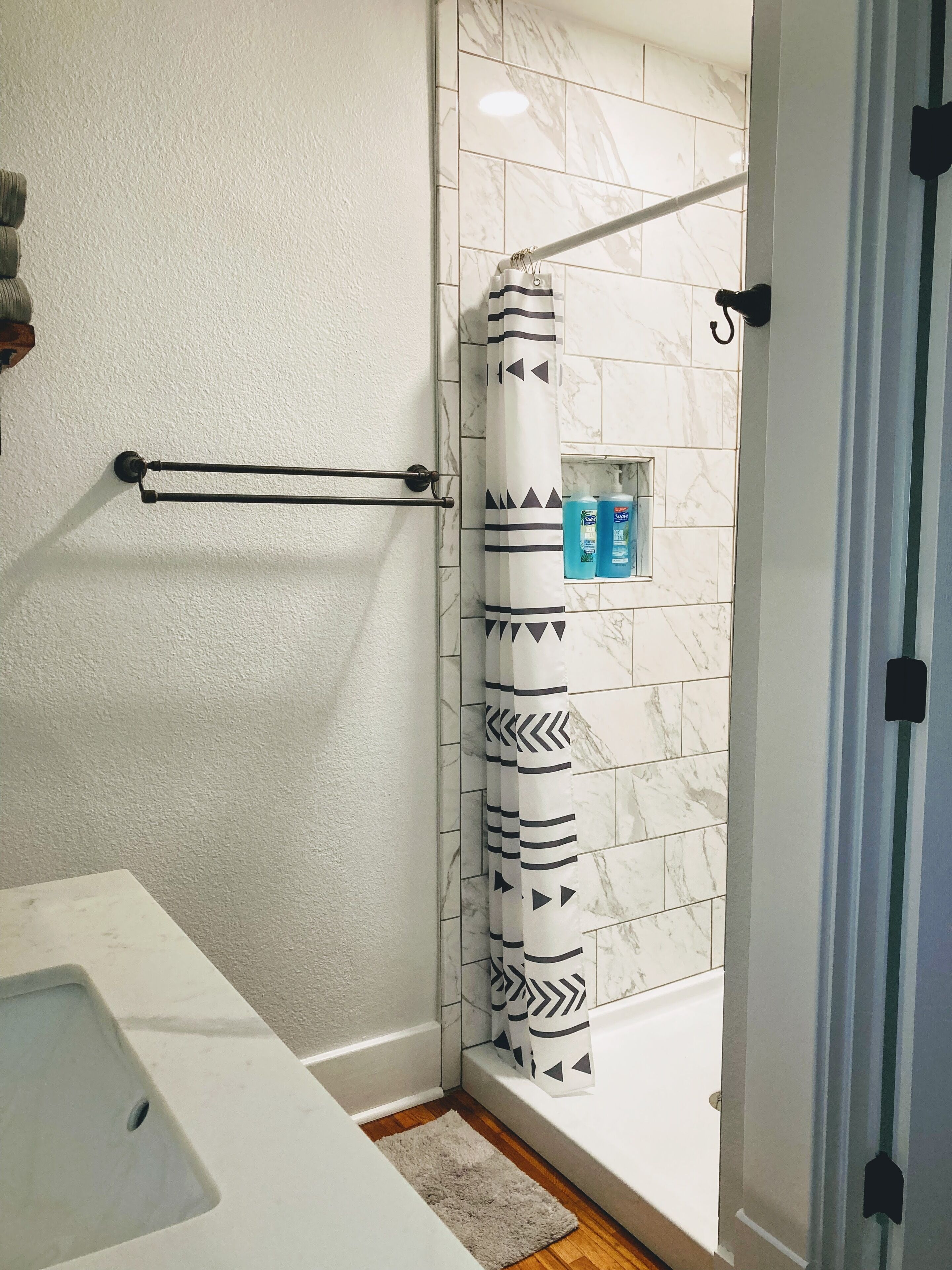 Combined shower/bathtub, hair dryer, towels, soap