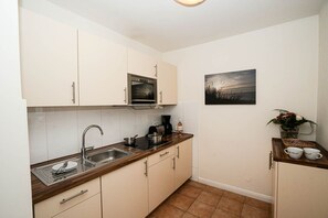 Refrigerador, microondas, parrilla de estufa y lavavajillas 