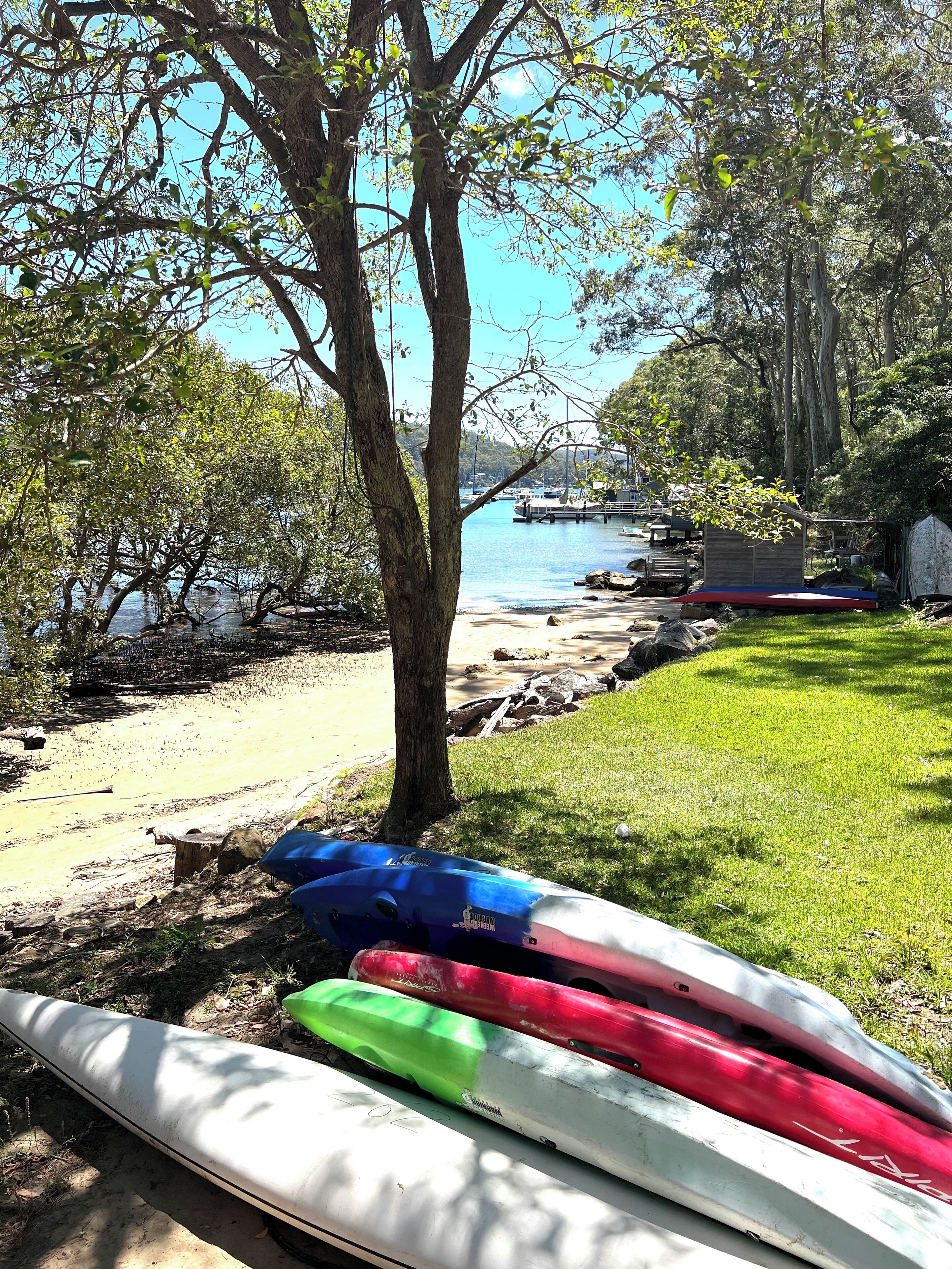 Kayaks next to Pittwater