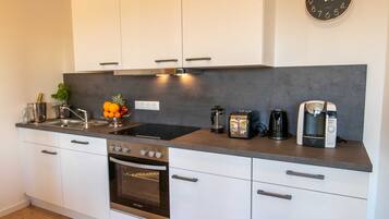 Fridge, oven, dishwasher, highchair