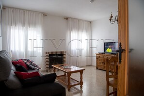 Una Smart TV, una chimenea