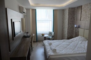 经典客房 | 笔记本电脑工作区、免费 WiFi、床单