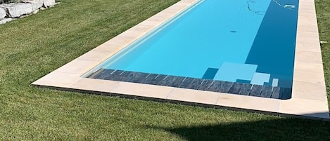 Piscina all'aperto, una piscina riscaldata