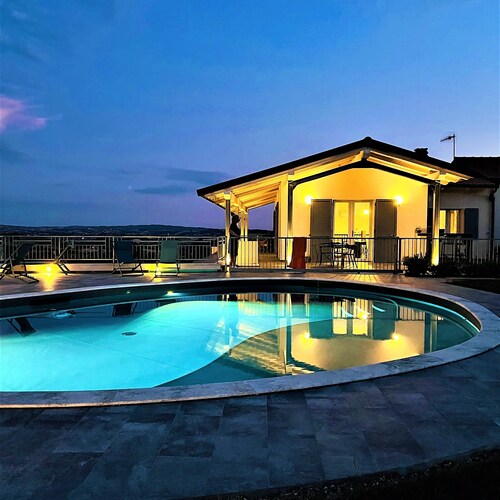 Luxury villa, swimming pool, shaded terraces, panoramic view, sauna fitness room