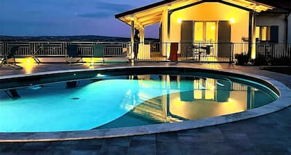 Luxury villa, swimming pool, shaded terraces, panoramic view, sauna fitness room