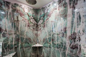 Bathtub, hair dryer, bidet, towels