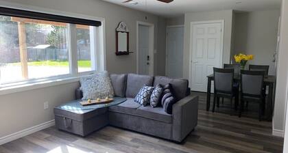 Two bedroom river side apartment with large private yard