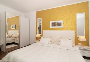 1 غرفة نوم ومكتب ومكواة/لوح كي وسرير سفر