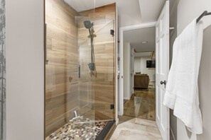 Combined shower/tub, hair dryer, towels, soap