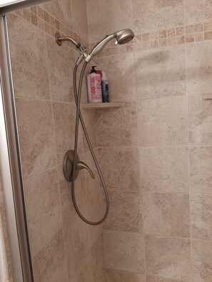 Shower, hair dryer, towels, soap - Birdhouse Apartment (Boise)