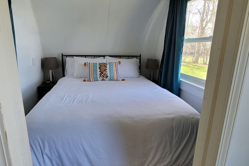 1 bedroom, desk, iron/ironing board, travel crib