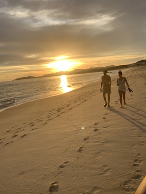 On the beach, sun loungers, beach towels
