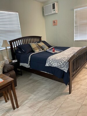 1 bedroom, desk, iron/ironing board, travel crib