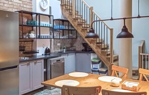 Fridge, stovetop, dishwasher, coffee/tea maker