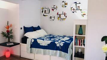 Fer et planche à repasser, lit parapluie, Wi-Fi gratuit, draps fournis