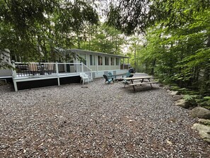 Outdoor dining - Point Sebago 3 BR, 1.5 bath Maine lake cottage near beach on Purple Rd (Casco)