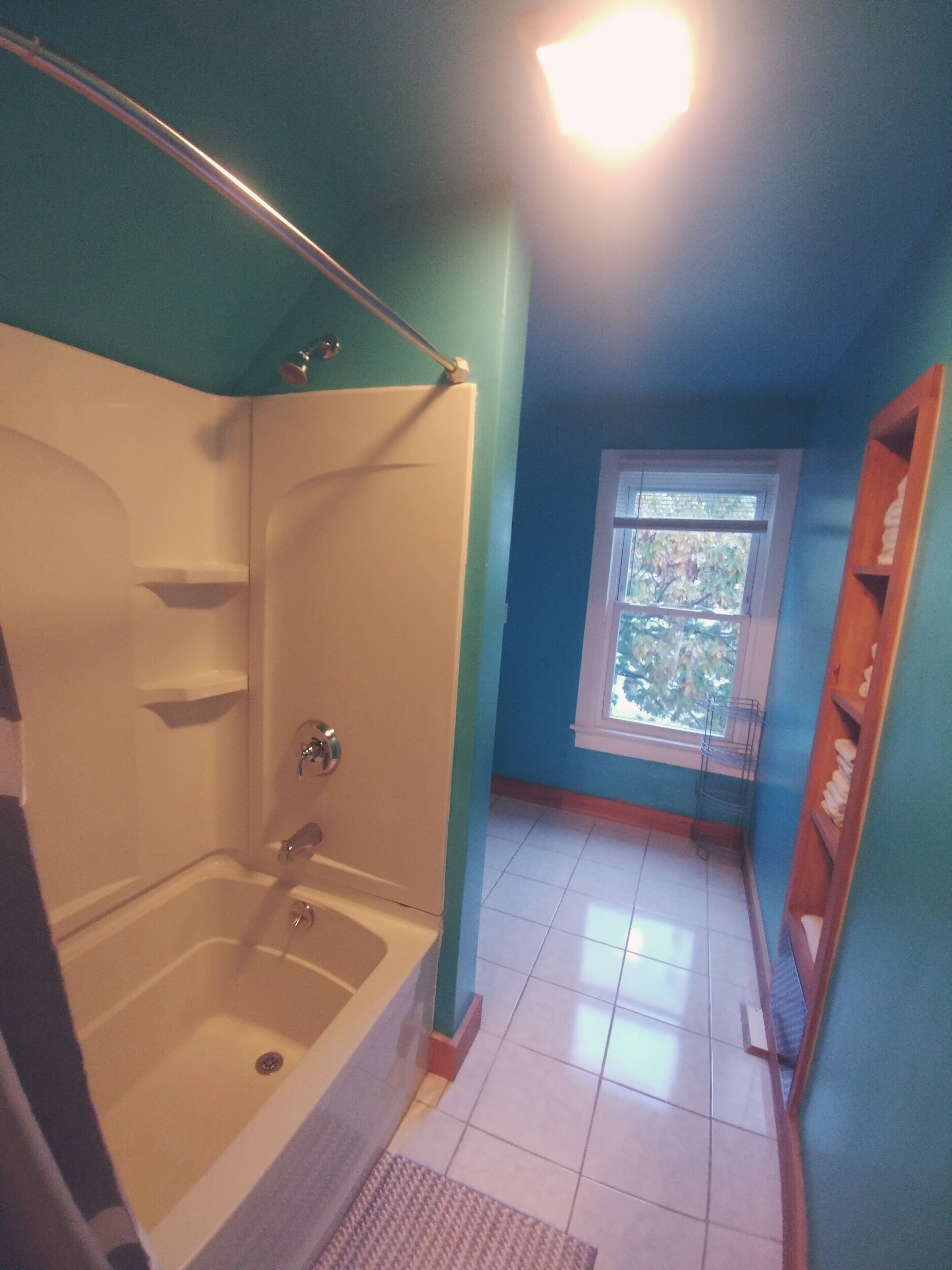 Combined shower/tub, hair dryer, towels, soap