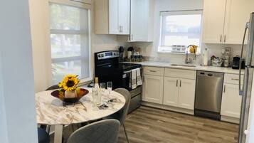 Coffee/tea maker, fridge, microwave, oven