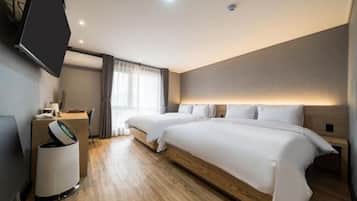 Family Twin Room, 2 Queen Beds, Non Smoking, City View | Premium bedding, memory-foam beds, individually decorated