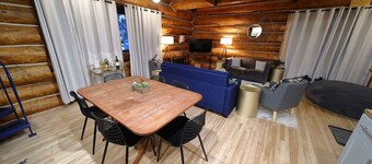 This beautiful log cottage has large windows that let in lots of light