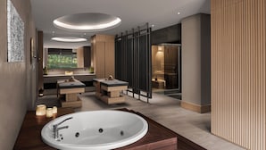 A modern bathroom with a large oval bathtub, a wooden vanity, and a glass shower enclosure. - NG Enjoy (Sapanca)