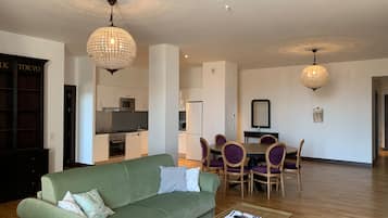 Standard Apartment, 3 Bedrooms | Living area | Flat-screen TV