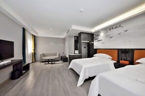 A modern hotel room with two beds, a flat-screen TV, a sofa, and a wall with bird illustrations. - New Beijing Hotel (Guangzhou Sun Yat Sen Memorial Hospital Yide Road Subway Station) (Guangzhou)