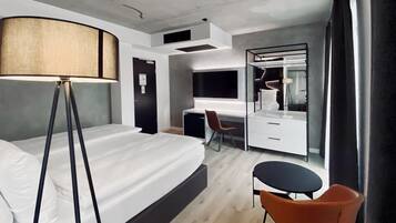 Hypo-allergenic bedding, free minibar, in-room safe, desk