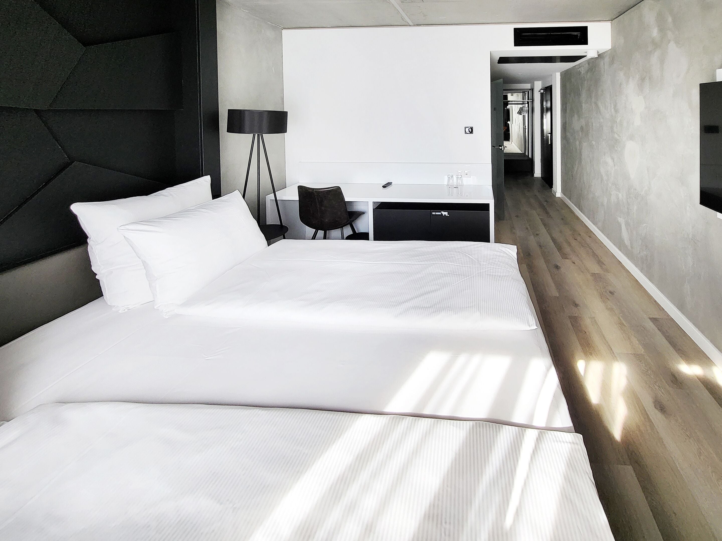 Hypoallergeen beddengoed, een gratis minibar, een kluis op de kamer