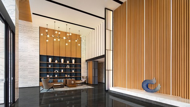 A modern lobby with a polished floor, a seating area with sofas and chairs, a wall with shelves displaying decorative items, and a unique blue sculpture. - Fairfield By Marriott Hangzhou Xiaoshan (Hangzhou)