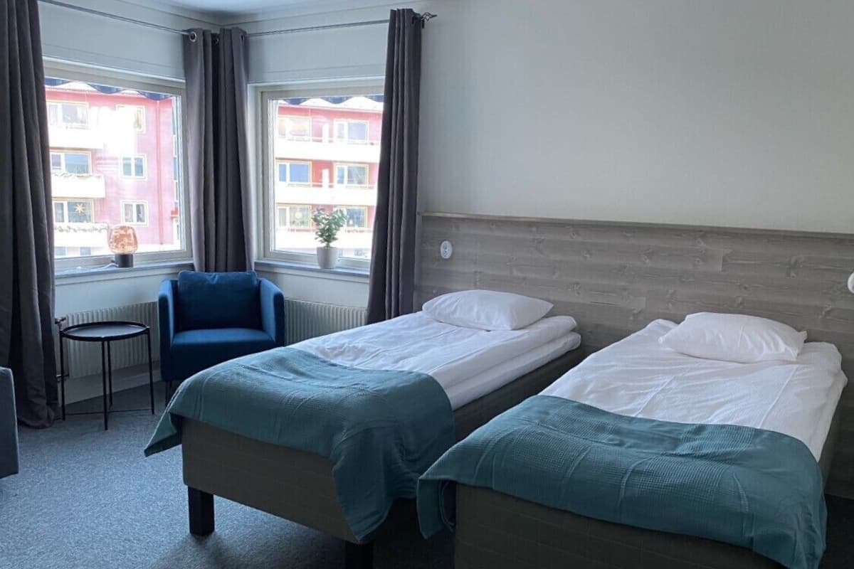 Habitación cuádruple familiar | Escritorio, espacio para trabajar con laptop y wifi gratis