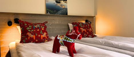 Desk, laptop workspace, free WiFi, bed sheets