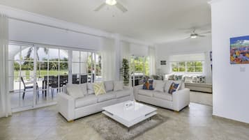 Elite Villa | Living area | 42-inch flat-screen TV with cable channels, TV