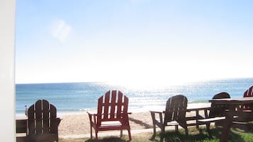 On the beach, sun-loungers