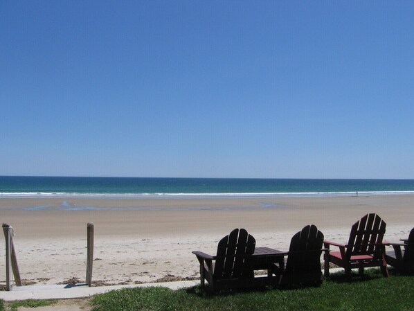 On the beach, sun-loungers