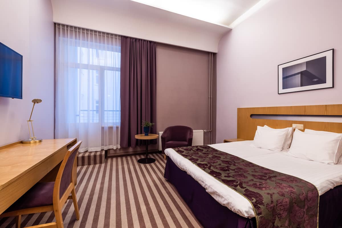 classic double room | desk, laptop workspace, blackout curtains, iron/ironing board