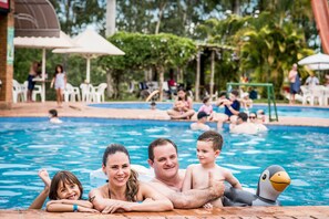 5 outdoor pools, open 10:00 AM to 7:30 PM, pool umbrellas, pool loungers
