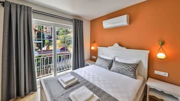 Basic Double Room, 1 King Bed, Mountain View | In-room safe, blackout drapes, iron/ironing board, free WiFi