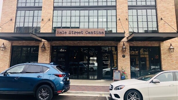 A building with a sign reading "Hale Street Cantina" and a brick facade. - ✽ Charming Cottage ✽ close to College/Town/Station (Wheaton)
