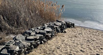 Vacation home Hilde on the lake with private beach for 4 adults, fireplace, boat and sauna