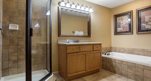Combined shower/tub, hair dryer, towels, soap