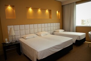 Deluxe Double or Twin Room | In-room safe, desk, laptop workspace, blackout drapes