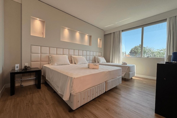 Deluxe Double or Twin Room | In-room safe, desk, laptop workspace, blackout drapes