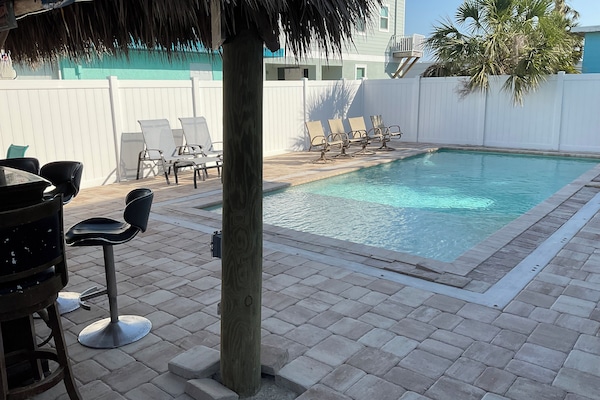 Pool with Sun Ledge and Tiki Bar