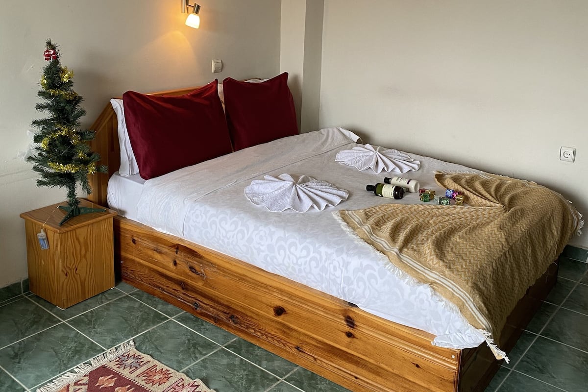 Individually furnished, desk, laptop workspace, iron/ironing board